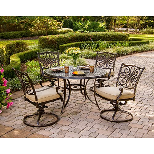 Hanover 5-Piece Four Traditions Swivel Rocker Chairs with Tan Cushions and 48" Round Cast Table, Patio Dining Set for 4, Premium Weather Resistant Outdoor Furniture